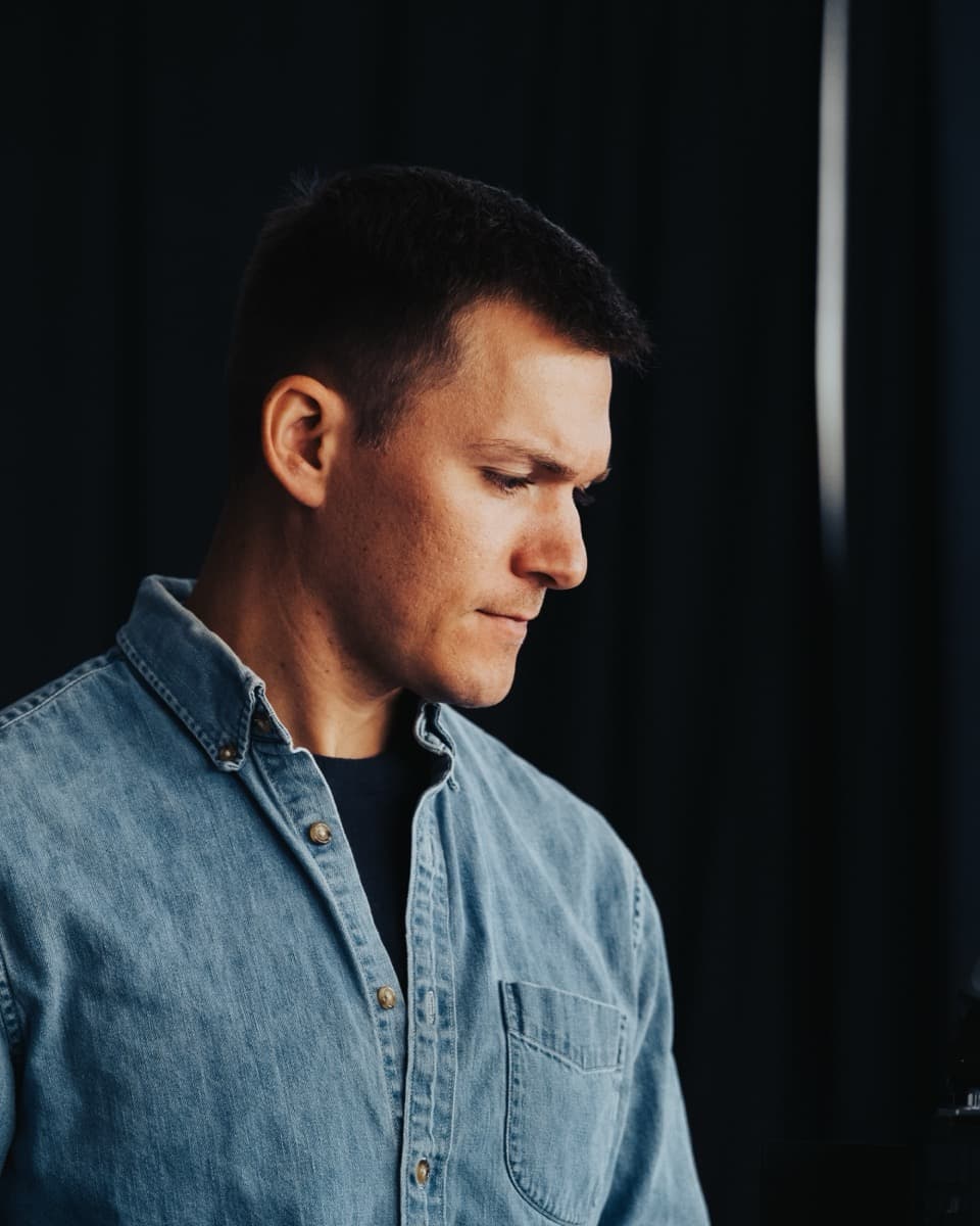 Portrait of Justin Keusenkothen, ECT's media lead, at work in the studio